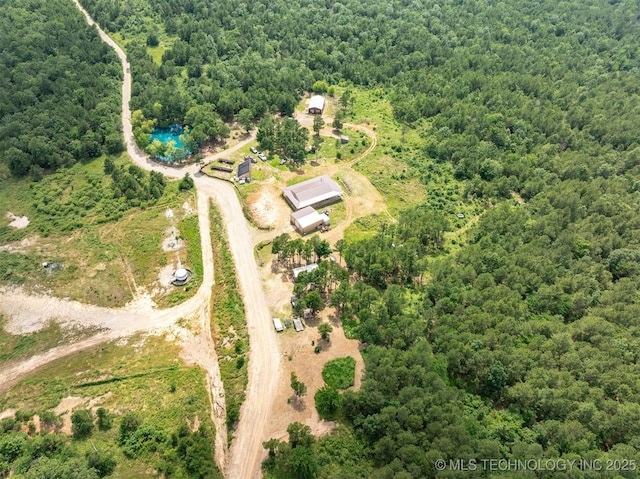 3819 129th Rd, Panola, OK 74559 - drone / aerial view of a heavily wooded area