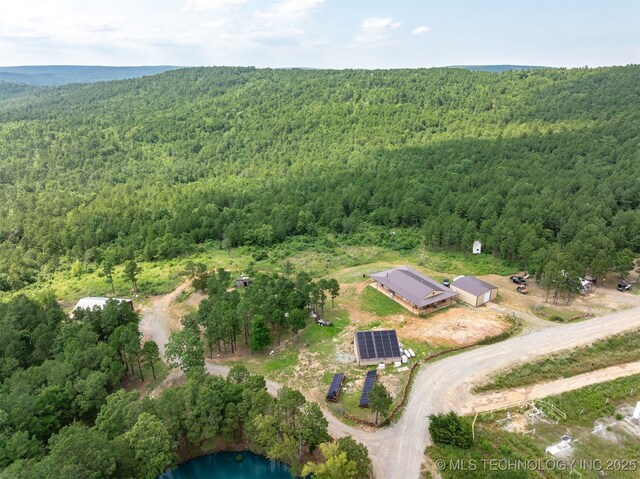 3819 129th Rd, Panola, OK 74559 - aerial overview of property's location with a forest