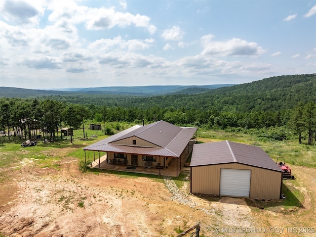 3819 129th Rd, Panola, OK 74559 - view of subject property with a heavily wooded area