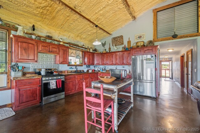 3819 129th Rd, Panola, OK 74559 - kitchen featuring stainless steel appliances, concrete flooring, reddish brown cabinets, high vaulted ceiling, and a sink