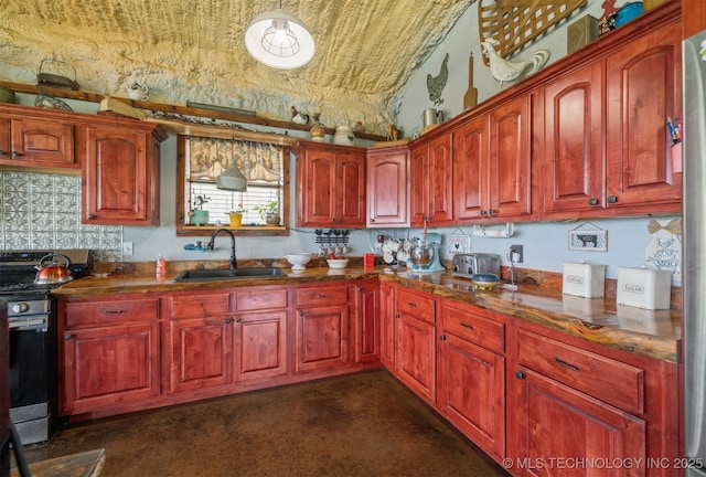 3819 129th Rd, Panola, OK 74559 - kitchen featuring stainless steel range, a sink, and dark countertops