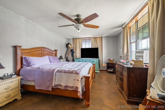 3819 129th Rd, Panola, OK 74559 - bedroom with cooling unit, a ceiling fan, and dark colored carpet