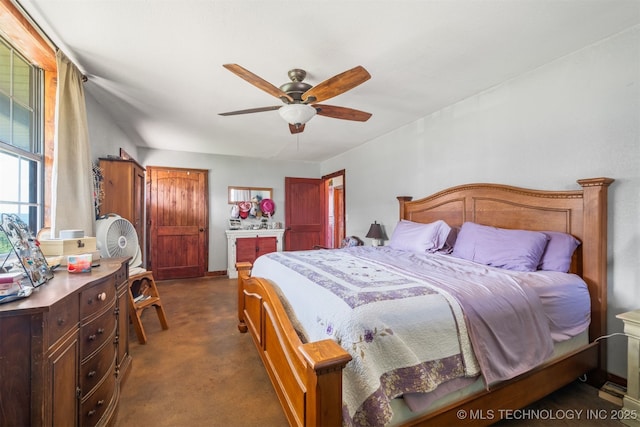 3819 129th Rd, Panola, OK 74559 - bedroom featuring dark colored carpet and ceiling fan