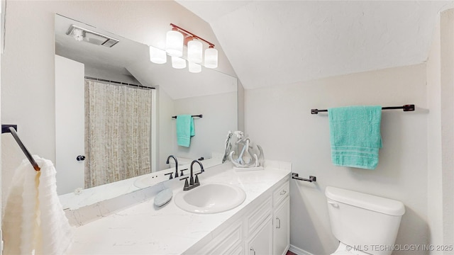 1120 N Juniper Pl, Broken Arrow, OK 74012 - bathroom featuring lofted ceiling, vanity, and toilet