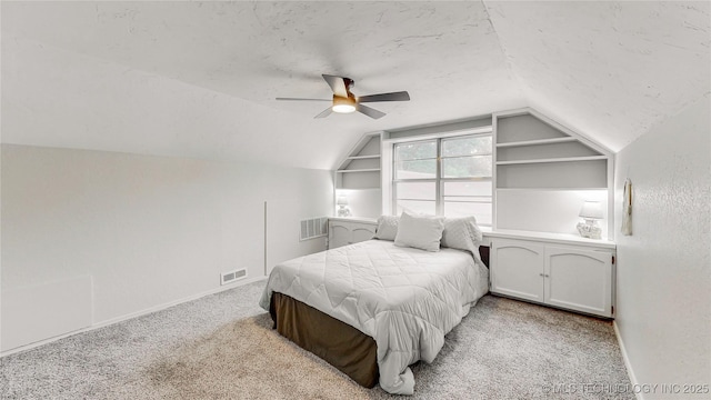 1120 N Juniper Pl, Broken Arrow, OK 74012 - bedroom featuring lofted ceiling, carpet, baseboards, a ceiling fan, and a textured ceiling