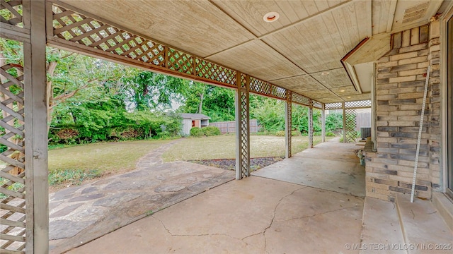 1120 N Juniper Pl, Broken Arrow, OK 74012 - view of patio with an outbuilding