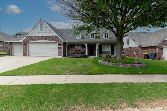 324 E 125th Pl S, Jenks, OK 74037 - view of front facade with a front yard, a garage, brick siding, concrete driveway, and roof with shingles