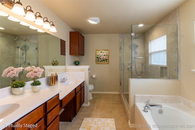 324 E 125th Pl S, Jenks, OK 74037 - full bath with double vanity, a shower stall, a garden tub, toilet, and tile patterned floors