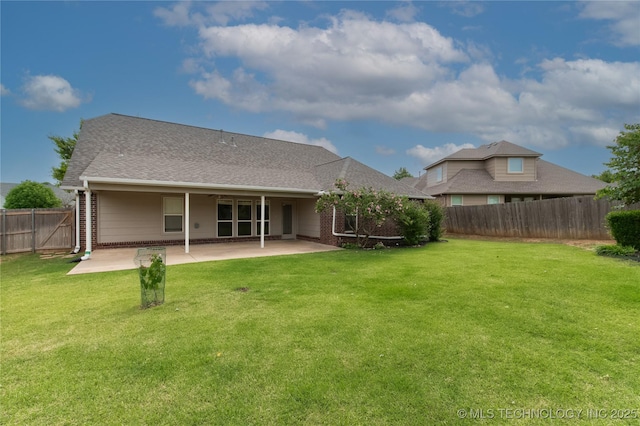324 E 125th Pl S, Jenks, OK 74037 - rear view of house with a patio, brick siding, and roof with shingles
