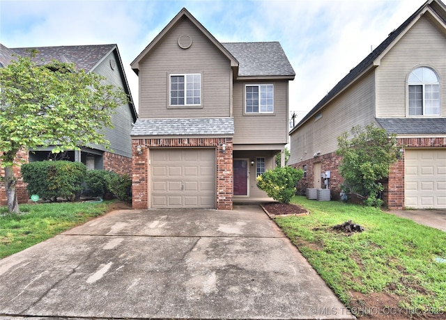307 W K St, Jenks, OK 74037 - traditional-style home with brick siding, a garage, a shingled roof, driveway, and a front yard
