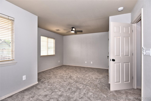307 W K St, Jenks, OK 74037 - carpeted empty room featuring ceiling fan, a smoke detector, and baseboards