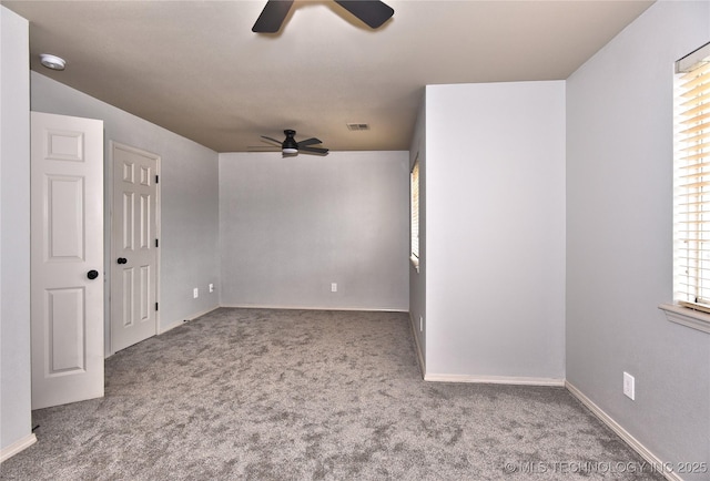 307 W K St, Jenks, OK 74037 - empty room featuring ceiling fan, carpet floors, a smoke detector, and baseboards
