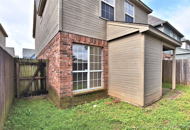 307 W K St, Jenks, OK 74037 - view of home's exterior with brick siding