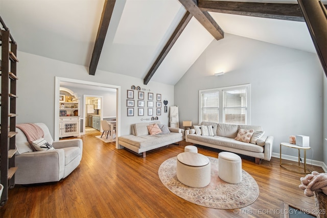 2124 E 19th St, Tulsa, OK 74104 - living room with beam ceiling, high vaulted ceiling, and wood finished floors