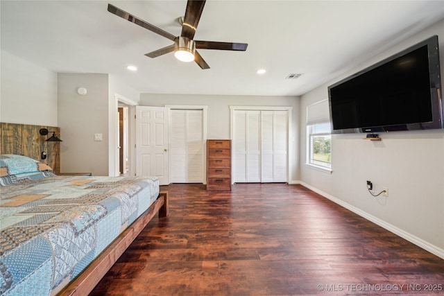 31102 S 4190th Rd, Inola, OK 74036 - bedroom featuring two closets, wood finished floors, baseboards, recessed lighting, and a ceiling fan