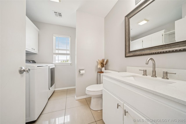 31102 S 4190th Rd, Inola, OK 74036 - bathroom featuring separate washer and dryer, toilet, baseboards, vanity, and tile patterned floors