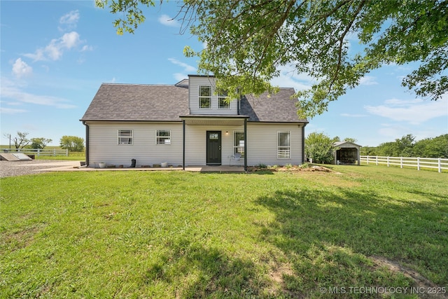 31102 S 4190th Rd, Inola, OK 74036 - back of property featuring a shingled roof, a detached carport, and a patio