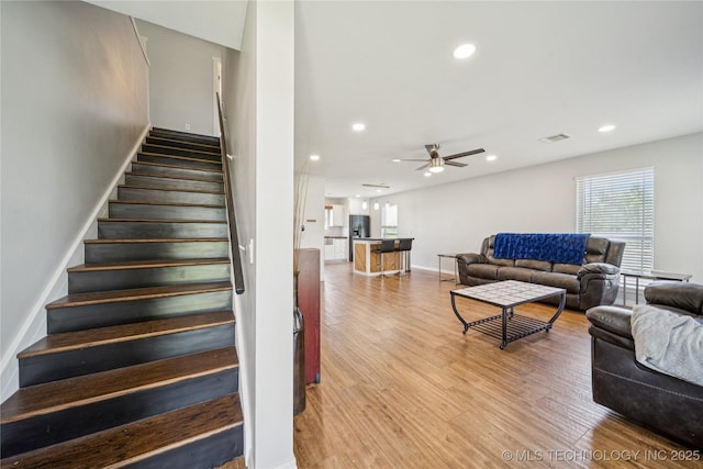 31102 S 4190th Rd, Inola, OK 74036 - stairway with wood finished floors, ceiling fan, and recessed lighting