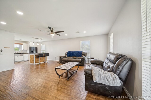 31102 S 4190th Rd, Inola, OK 74036 - living area with light wood-style flooring, a ceiling fan, recessed lighting, and baseboards