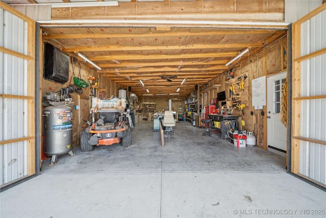 31102 S 4190th Rd, Inola, OK 74036 - basement with a garage and a workshop area