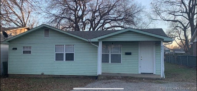 921 E 2nd St, Cushing, OK 74023 - back of property featuring roof with shingles