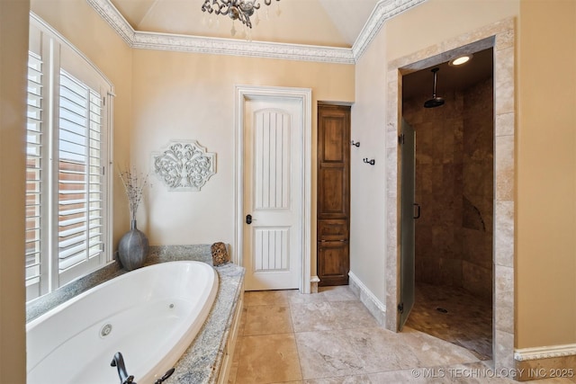 5912 E 119th St, Tulsa, OK 74137 - bathroom featuring a shower stall, a jetted tub, baseboards, vaulted ceiling, and tile patterned flooring