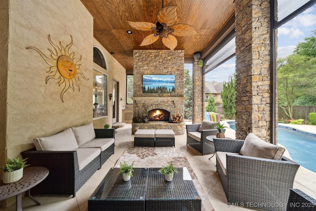 5912 E 119th St, Tulsa, OK 74137 - view of patio / terrace featuring a ceiling fan and an outdoor living space with a fireplace