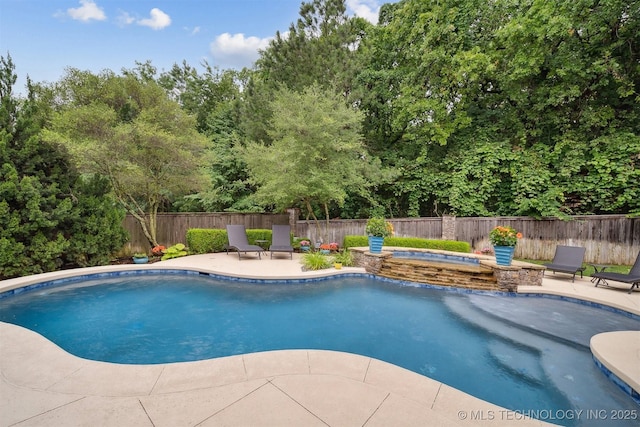 5912 E 119th St, Tulsa, OK 74137 - view of pool featuring an in-ground hot tub, a patio area, a fenced backyard, and view of scattered trees