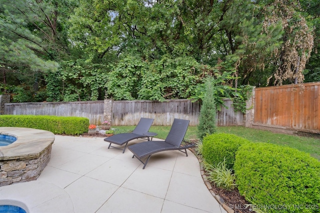 5912 E 119th St, Tulsa, OK 74137 - fenced backyard with a patio area