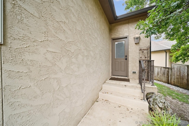 5912 E 119th St, Tulsa, OK 74137 - view of exterior entry with stucco siding