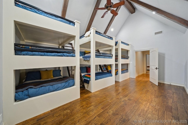 5912 E 119th St, Tulsa, OK 74137 - bedroom featuring beam ceiling, high vaulted ceiling, and wood finished floors