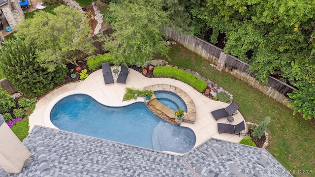 5912 E 119th St, Tulsa, OK 74137 - view of swimming pool with a patio area, a fenced backyard, and a pool with connected hot tub