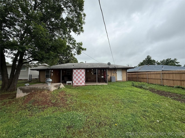 1436 E Broadway, Cushing, OK 74023 - back of property with a patio area
