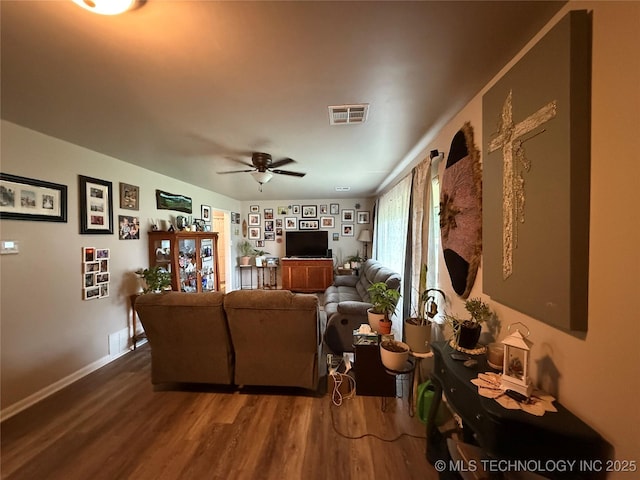 1436 E Broadway, Cushing, OK 74023 - living room featuring wood finished floors and a ceiling fan