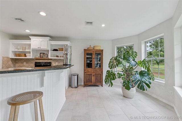 11587 W 86th St S, Sapulpa, OK 74066 - kitchen featuring open shelves, plenty of natural light, tasteful backsplash, white cabinets, and recessed lighting