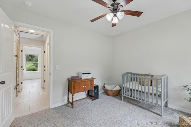 11587 W 86th St S, Sapulpa, OK 74066 - carpeted bedroom with baseboards, tile patterned floors, and a ceiling fan