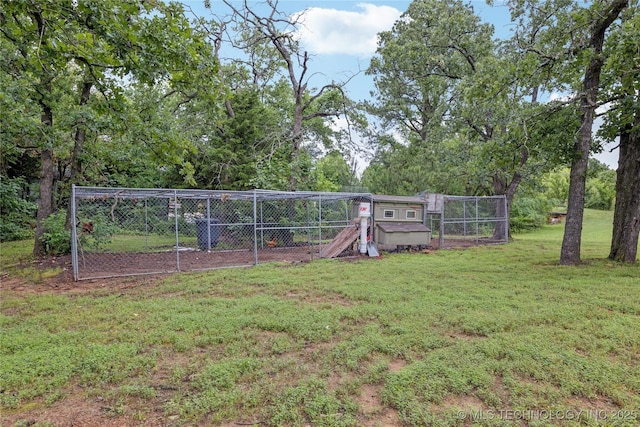 11587 W 86th St S, Sapulpa, OK 74066 - view of grassy yard with exterior structure and an outdoor structure
