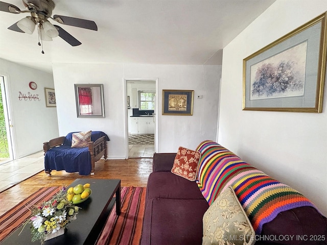 226 W Seneca St, Tahlequah, OK 74464 - living area with ceiling fan and wood finished floors