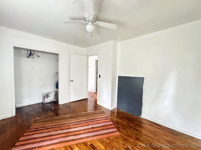 226 W Seneca St, Tahlequah, OK 74464 - unfurnished room featuring wood finished floors, a ceiling fan, and baseboards