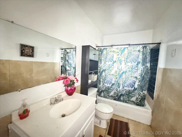 226 W Seneca St, Tahlequah, OK 74464 - bathroom featuring vanity, toilet, shower / tub combo, and tile walls