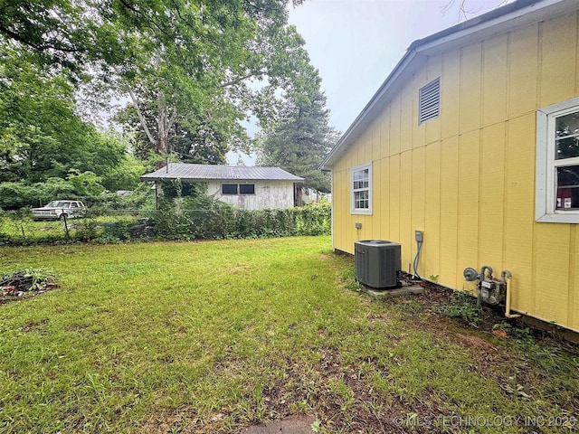 226 W Seneca St, Tahlequah, OK 74464 - view of green lawn featuring central AC unit