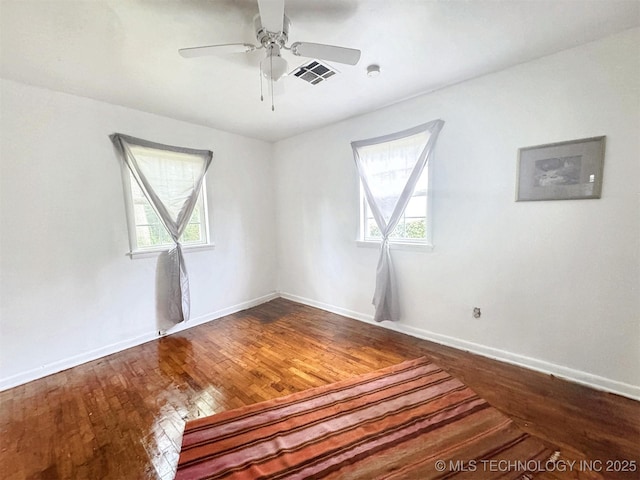226 W Seneca St, Tahlequah, OK 74464 - empty room with wood-type flooring, a ceiling fan, and baseboards
