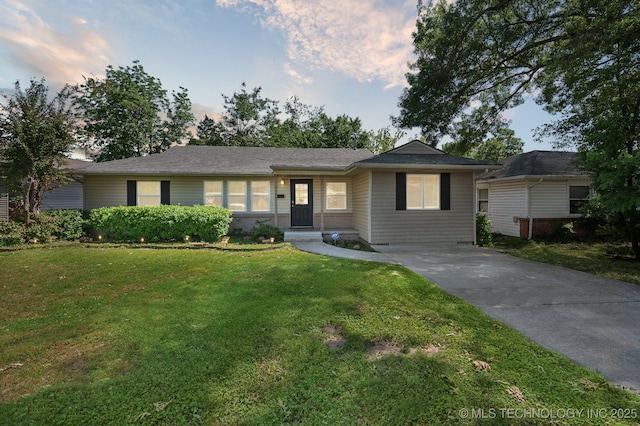 4126 E 36th Pl, Tulsa, OK 74135 - ranch-style house with driveway and a front lawn
