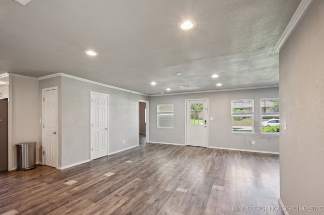 4126 E 36th Pl, Tulsa, OK 74135 - unfurnished living room with wood finished floors, recessed lighting, ornamental molding, and baseboards