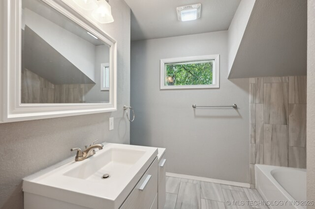 4126 E 36th Pl, Tulsa, OK 74135 - bathroom with vanity and baseboards