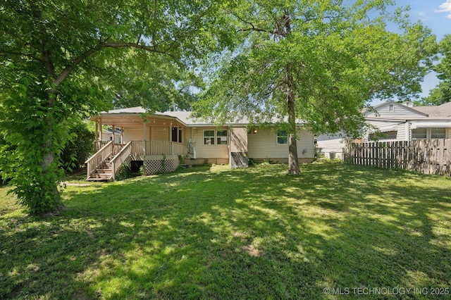 4126 E 36th Pl, Tulsa, OK 74135 - rear view of house featuring covered porch and stairway