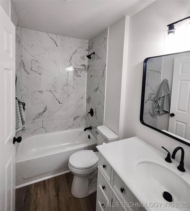 1400 NE 3rd St, Pryor, OK 74361 - full bathroom with toilet, wood finished floors, vanity, tub / shower combination, and a textured ceiling