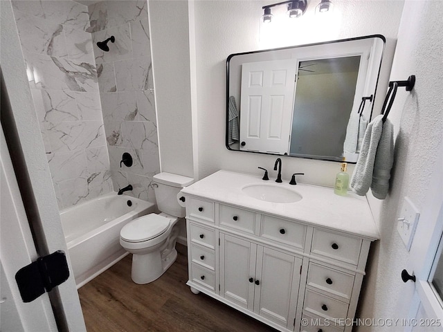 1400 NE 3rd St, Pryor, OK 74361 - bathroom with toilet, wood finished floors, vanity, shower / bath combination, and a textured wall
