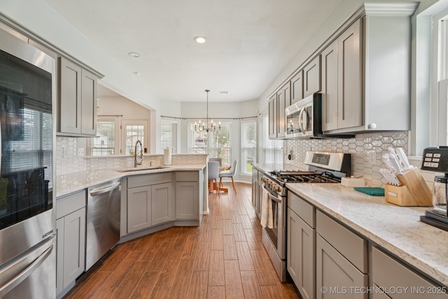 19804 E 45th St S, Broken Arrow, OK 74014 - kitchen featuring stainless steel appliances, gray cabinets, dark wood-style floors, and recessed lighting