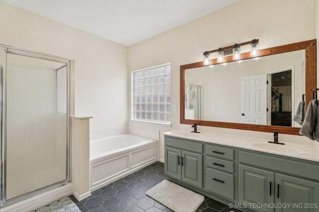 19804 E 45th St S, Broken Arrow, OK 74014 - bathroom featuring a garden tub, double vanity, tile patterned flooring, and a shower stall